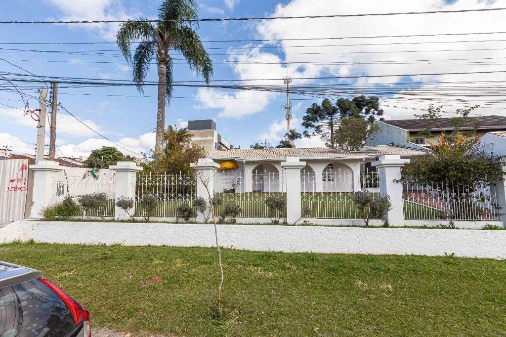 Casa com 3 dormitórios à venda, 320 m² por R$ 1.980.000 - Curitiba